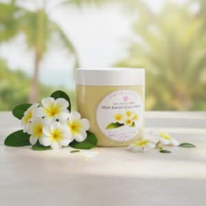 Beurre corporel monoï à la texture fondante, soin nourrissant pour le corps et les cheveux secs.