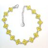 Funkelndes gelbes Kleeblatt-Armband